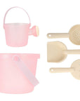 Juegos de playa con purpurina rosa