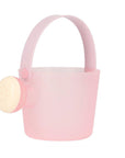 Juegos de playa con purpurina rosa