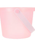Juegos de playa con purpurina rosa