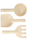 Juegos de playa con purpurina rosa