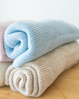 Couverture en laine mélangée avec broderie